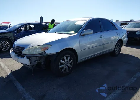 2003 Toyota Camry Xle V6 z USA, uszkodzony, nr VIN 4T1BF32K83U555603